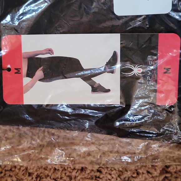 See Other Listing For This Item.NWT SPYDER active leggings, black print, pockets - Picture 9 of 11